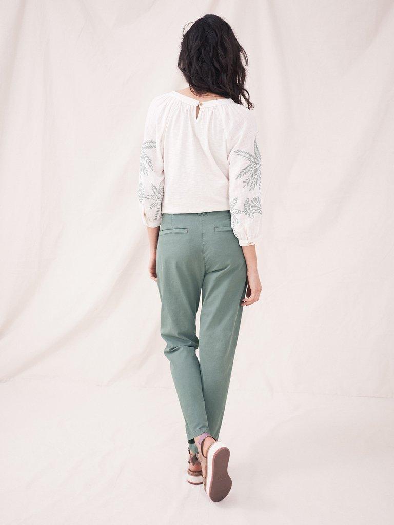 Twister Chino Trousers in MID GREEN - MODEL BACK