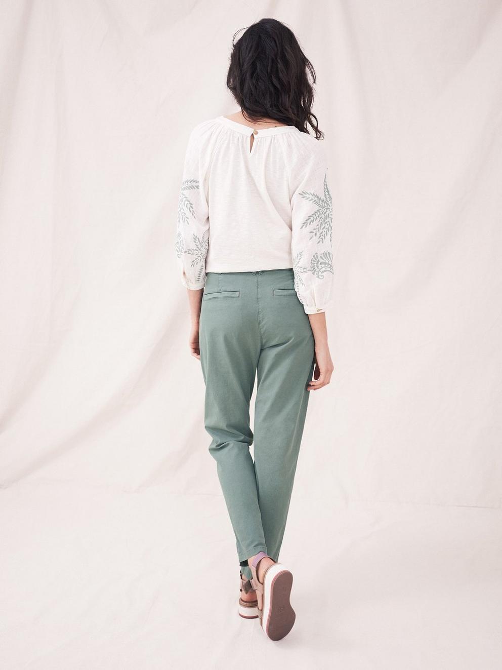 Twister Chino Trousers in MID GREEN - MODEL BACK
