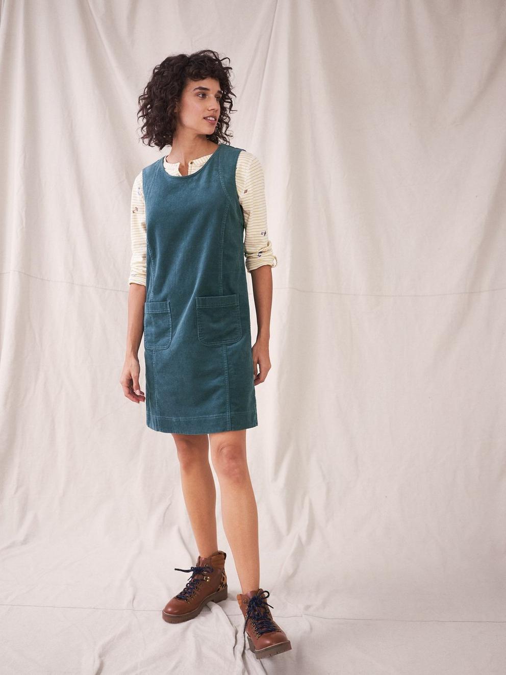 June Organic Pinny Dress in MID GREEN - MODEL FRONT