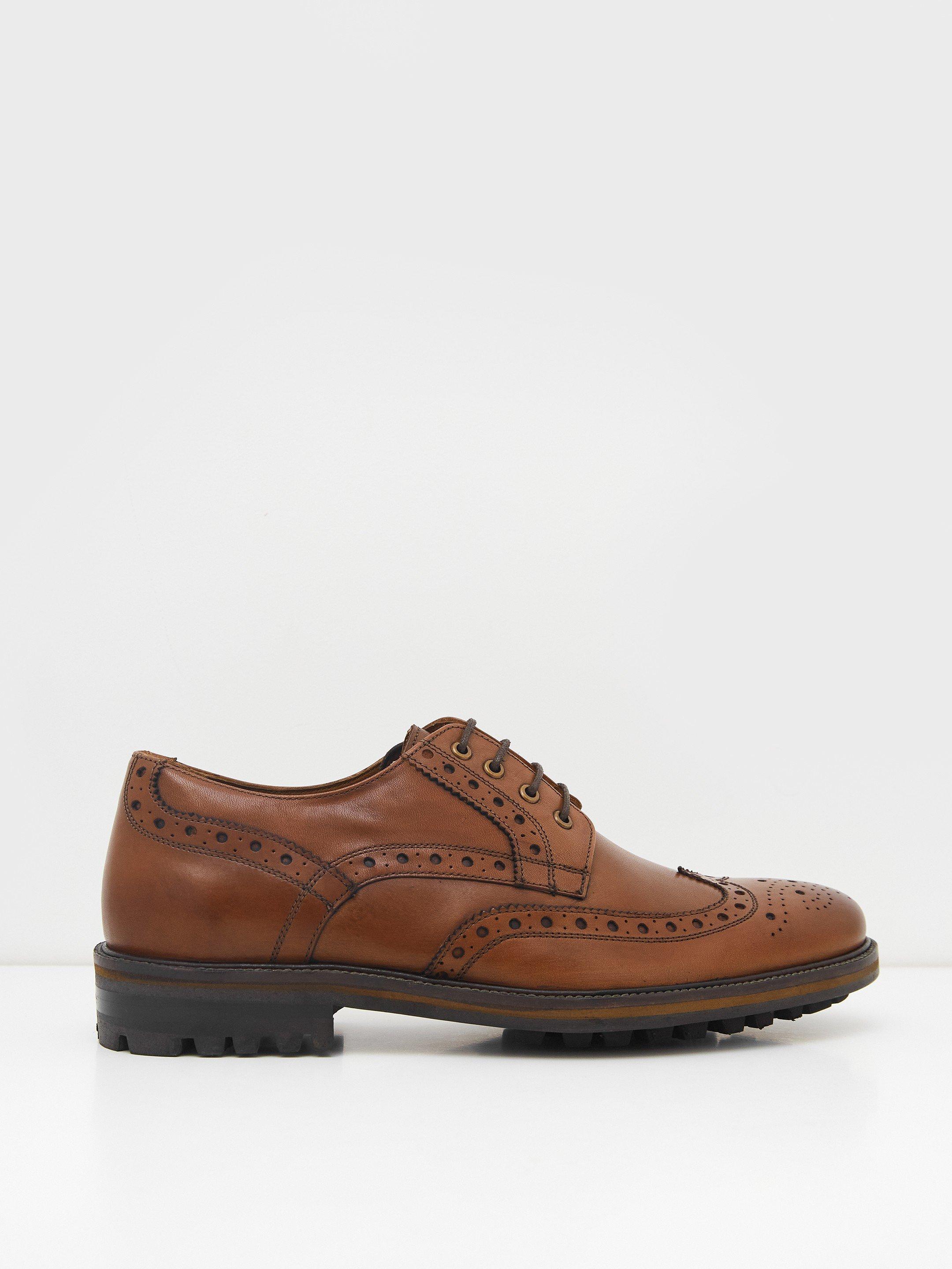 Arlo Brogue Leather Shoe in DARK TAN - MODEL FRONT