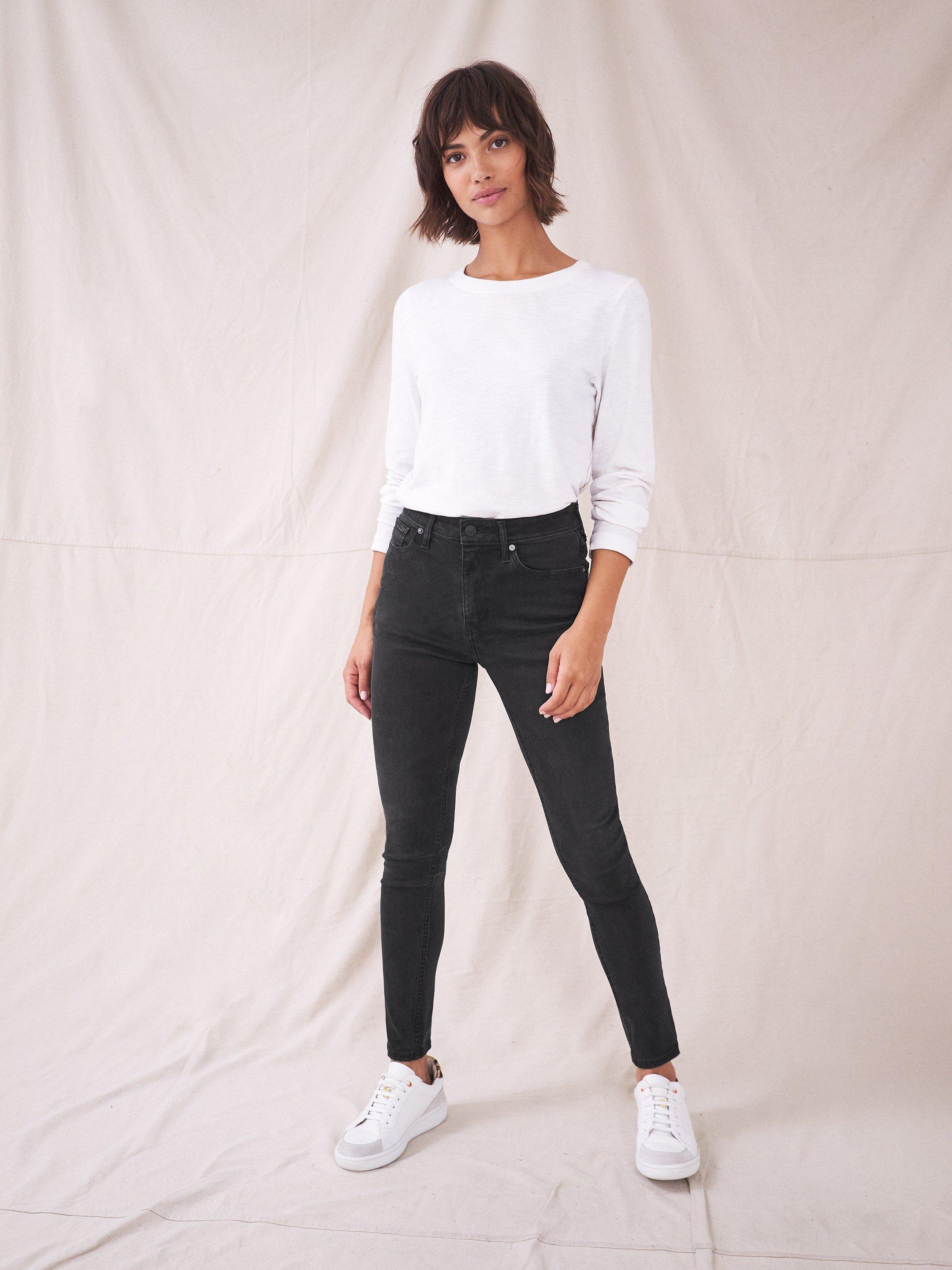 Amelia Mid Rise Skinny Jean in WASHED BLK - MODEL FRONT