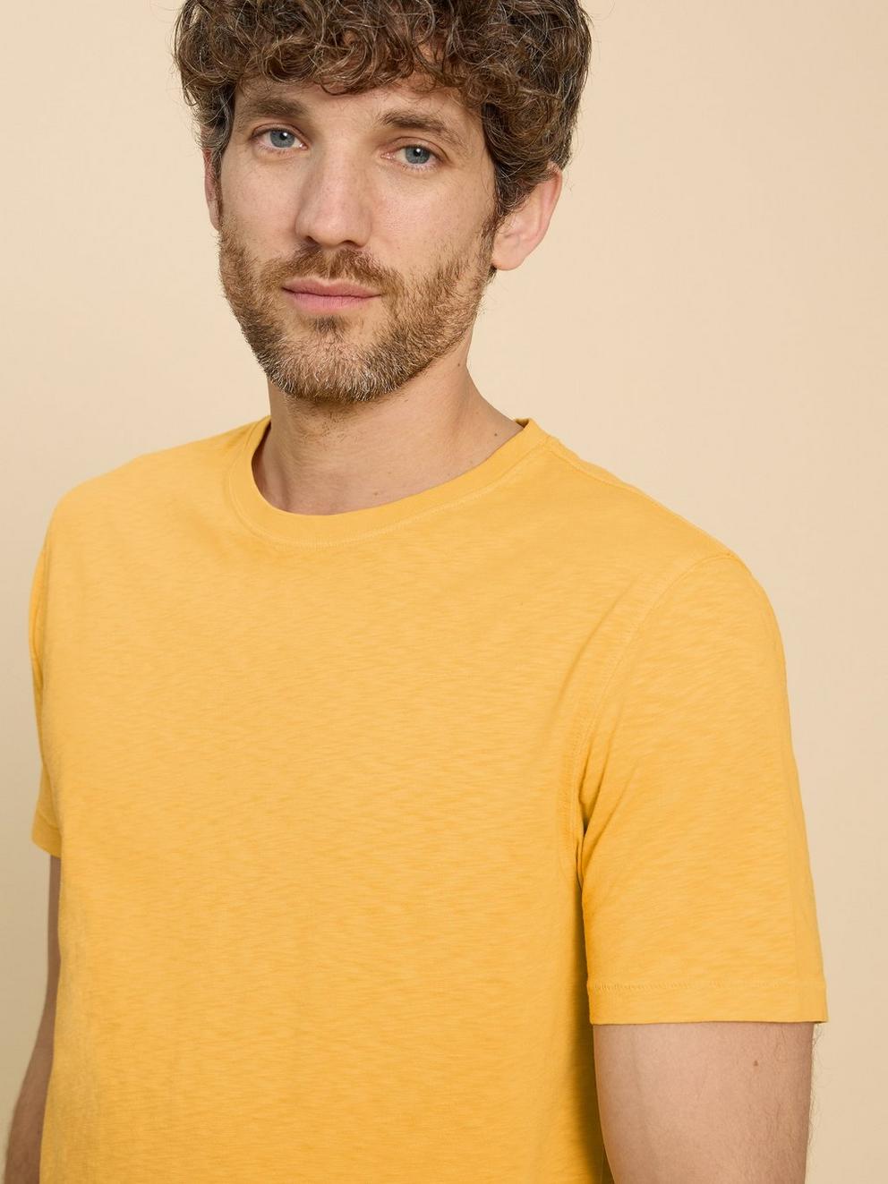 Abersoch Short Sleeve Tee in DK YELLOW - MODEL FRONT