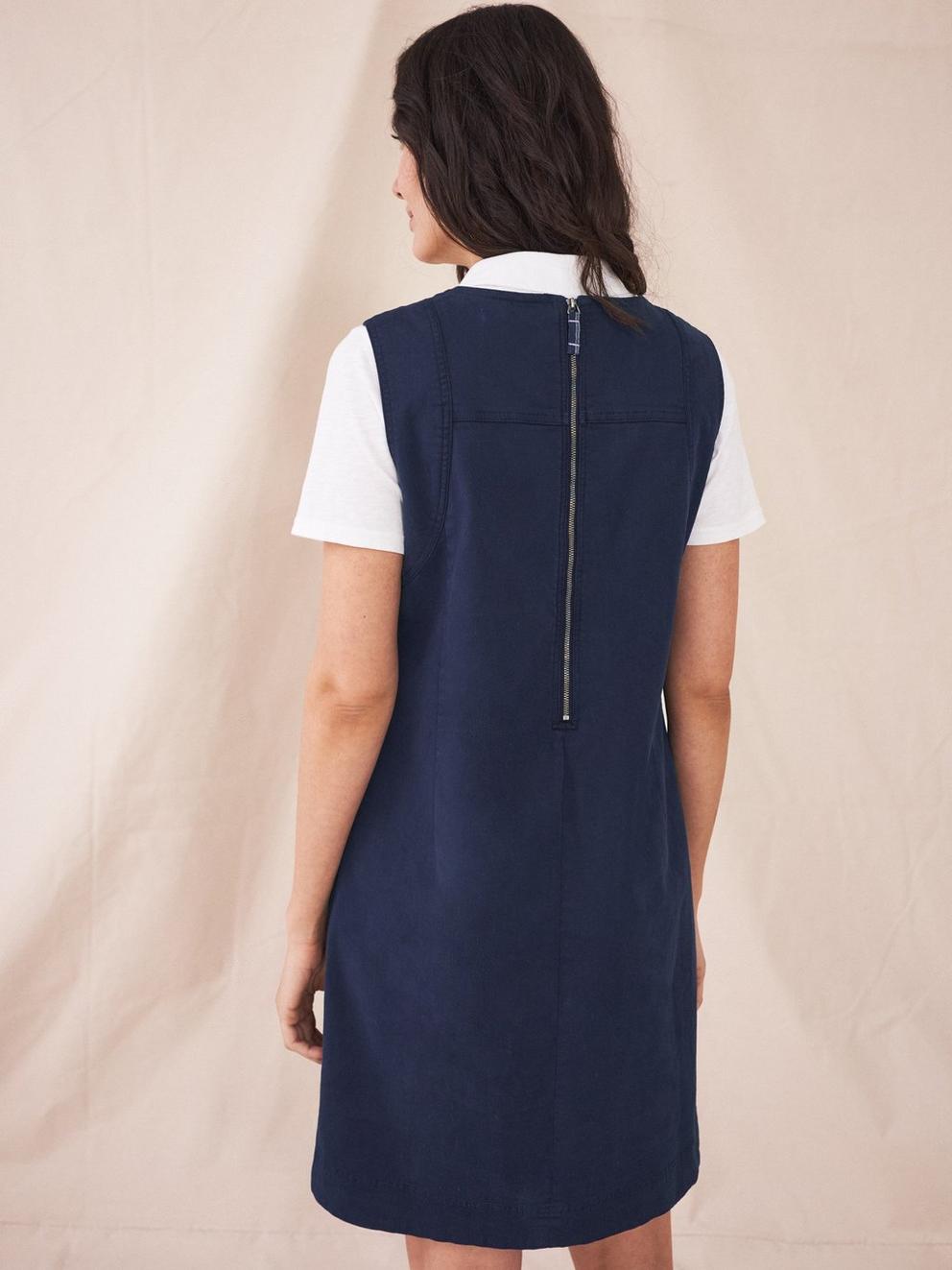 Janey Organic Cotton Pinafore in DARK NAVY - MODEL BACK