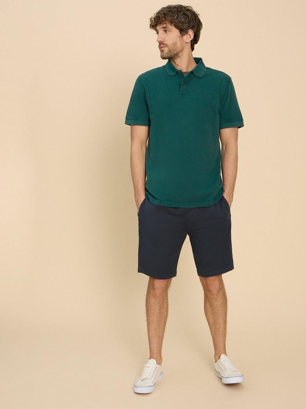 Utility Polo in DK TEAL - MODEL DETAIL