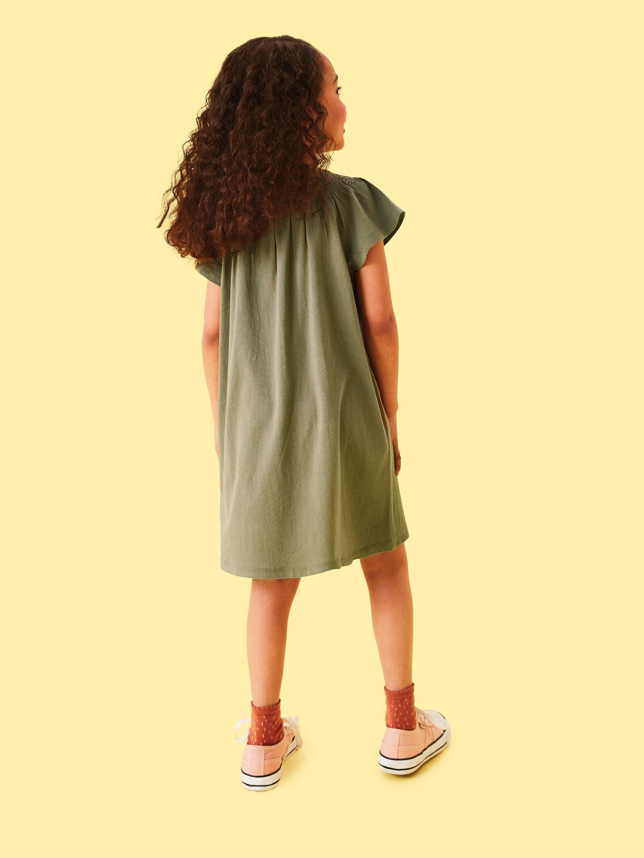 Lolly Dress in MID GREEN - MODEL BACK