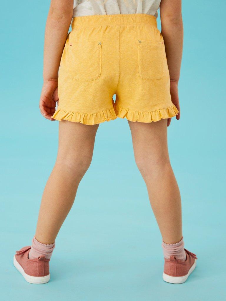 Renee Frill Short in MID YELLOW - MODEL BACK