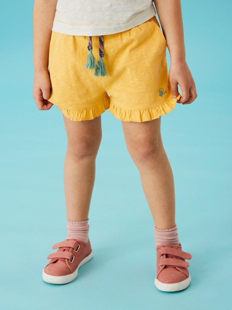Renee Frill Short in MID YELLOW - MODEL DETAIL
