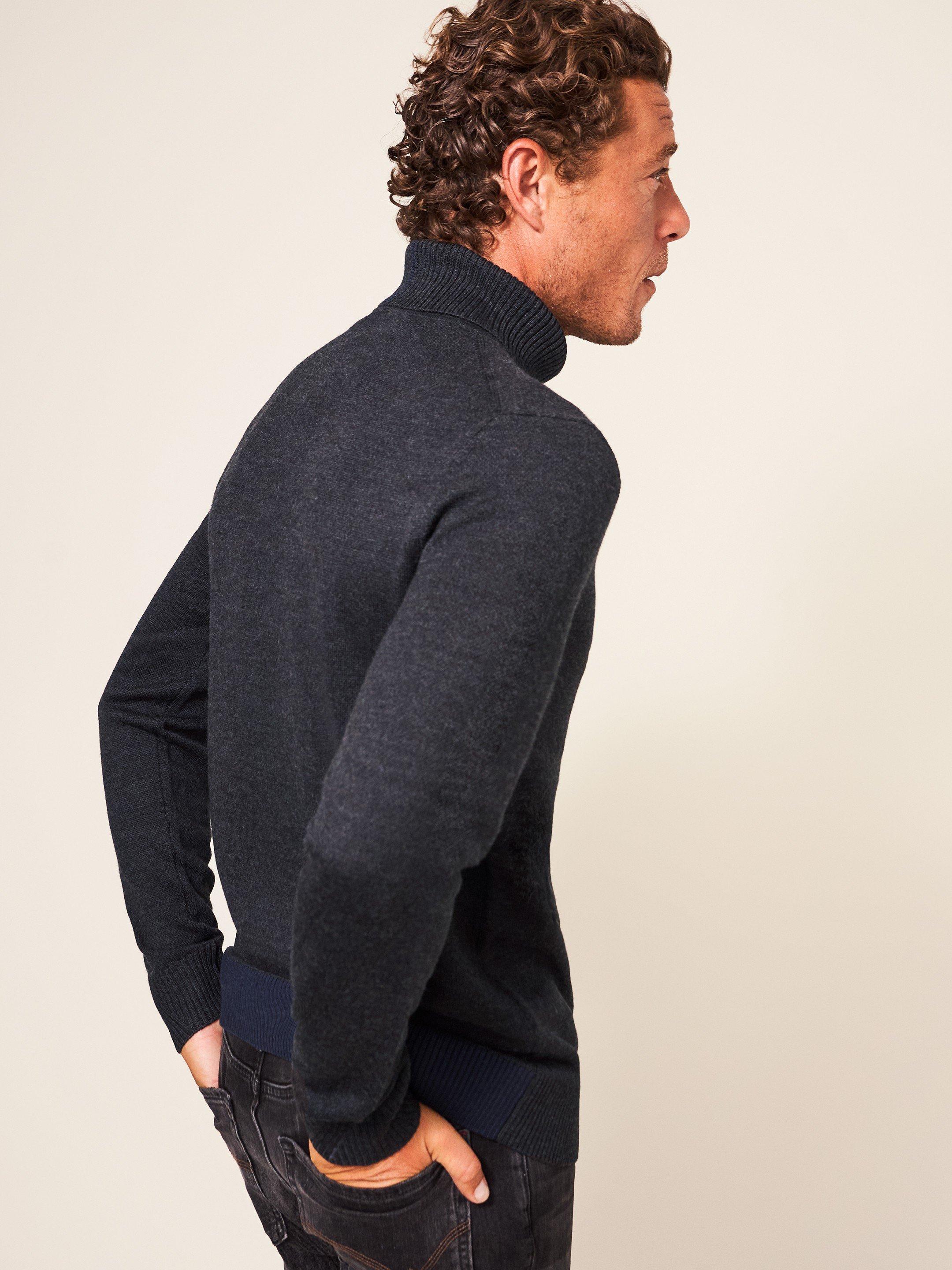 Newport Merino Roll Neck in DARK GREY - MODEL BACK