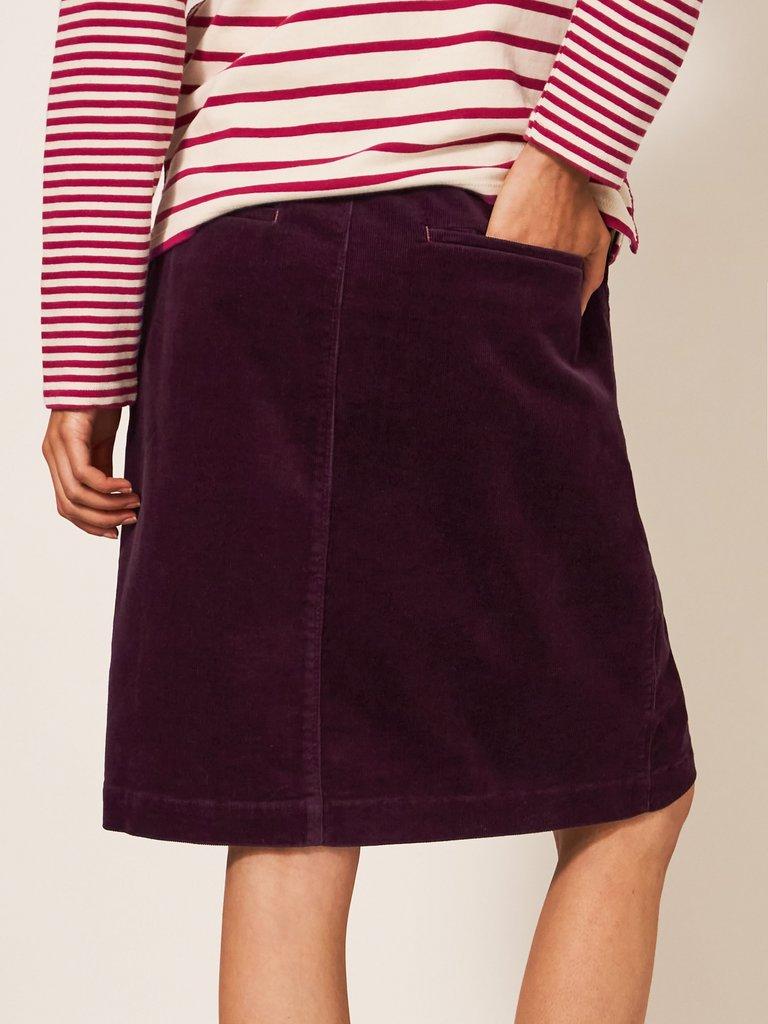 Melody Organic Cord Skirt in DK PLUM - MODEL BACK