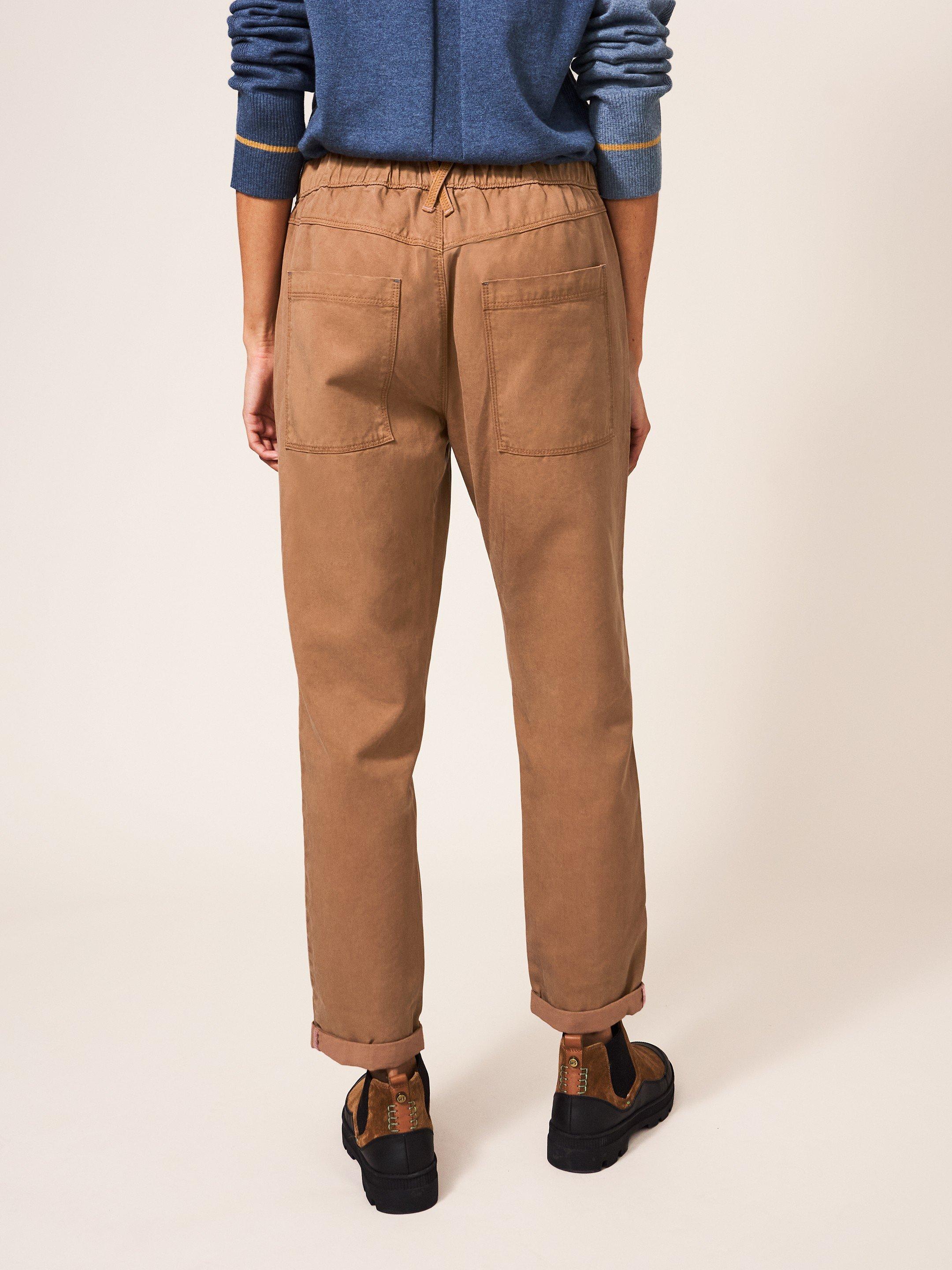 Thea Tapered Trouser in MID TAN - MODEL BACK