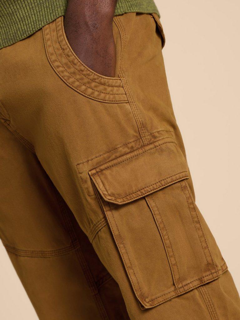 Kegworth Organic Cargo Trouser in DARK TAN - MODEL FRONT