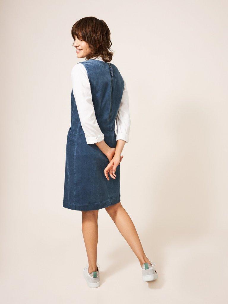 Lothbury Organic Cord Pinny in DUS BLUE - MODEL BACK