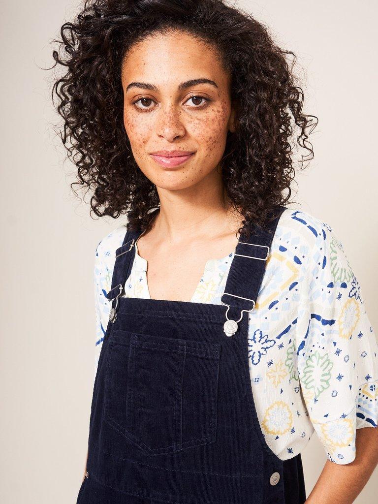 Emmie Organic Cord Midi Pinafore in DARK NAVY - MODEL DETAIL