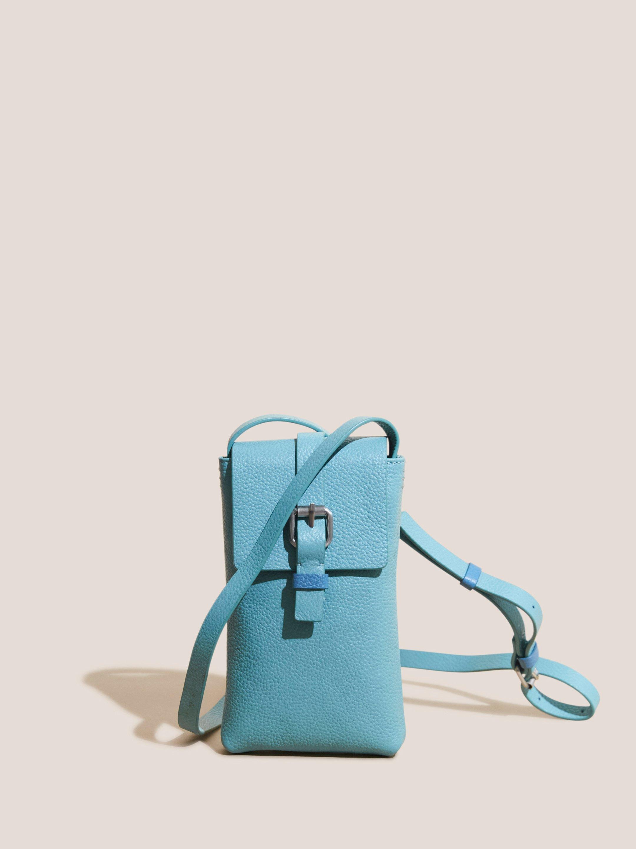 Clara Buckle Phone Bag in D EGG BLUE - MODEL FRONT