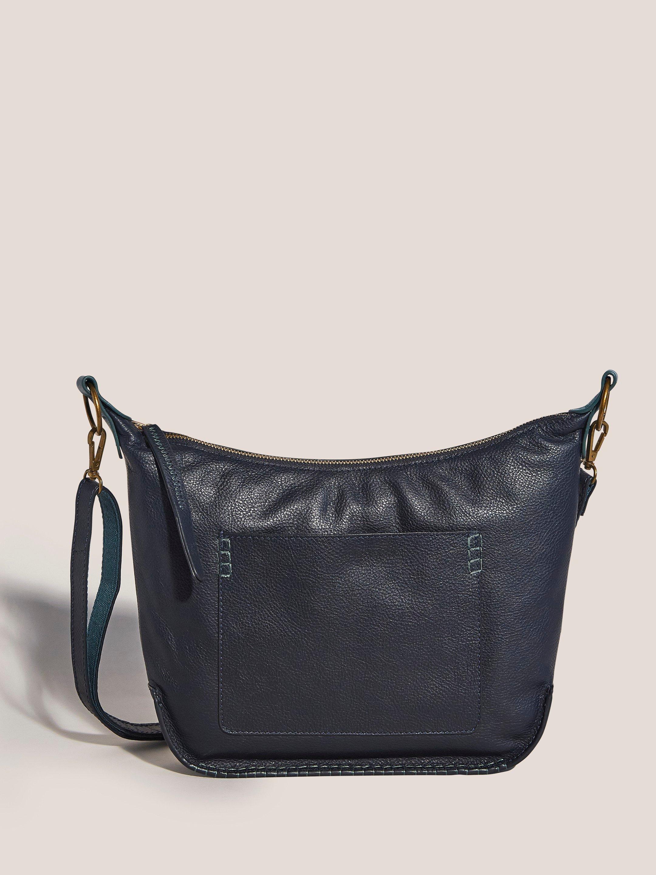 Flora Leather Crossbody Bag in DARK NAVY - MODEL FRONT