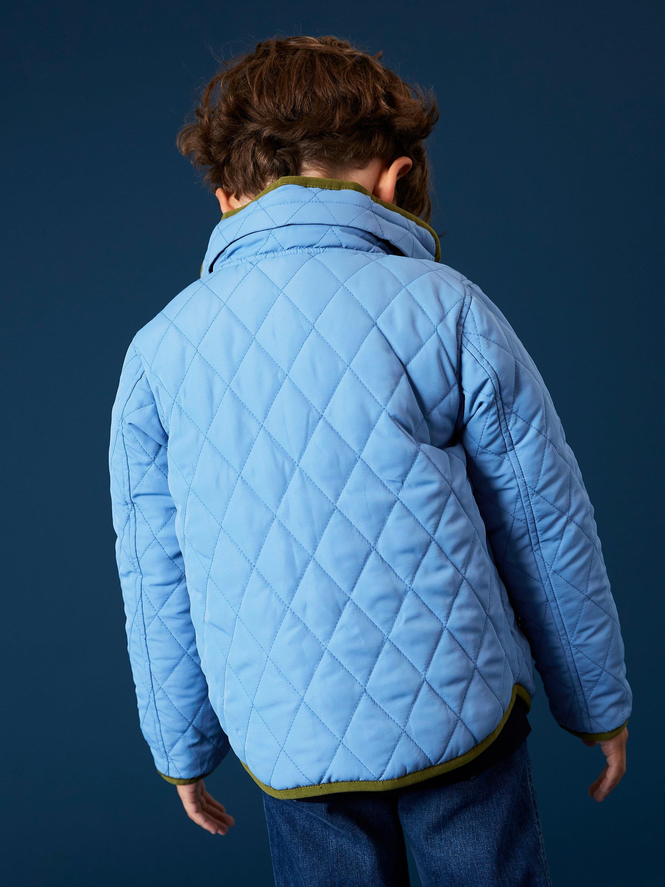 Reversible Quilted Jacket in MID BLUE - MODEL BACK