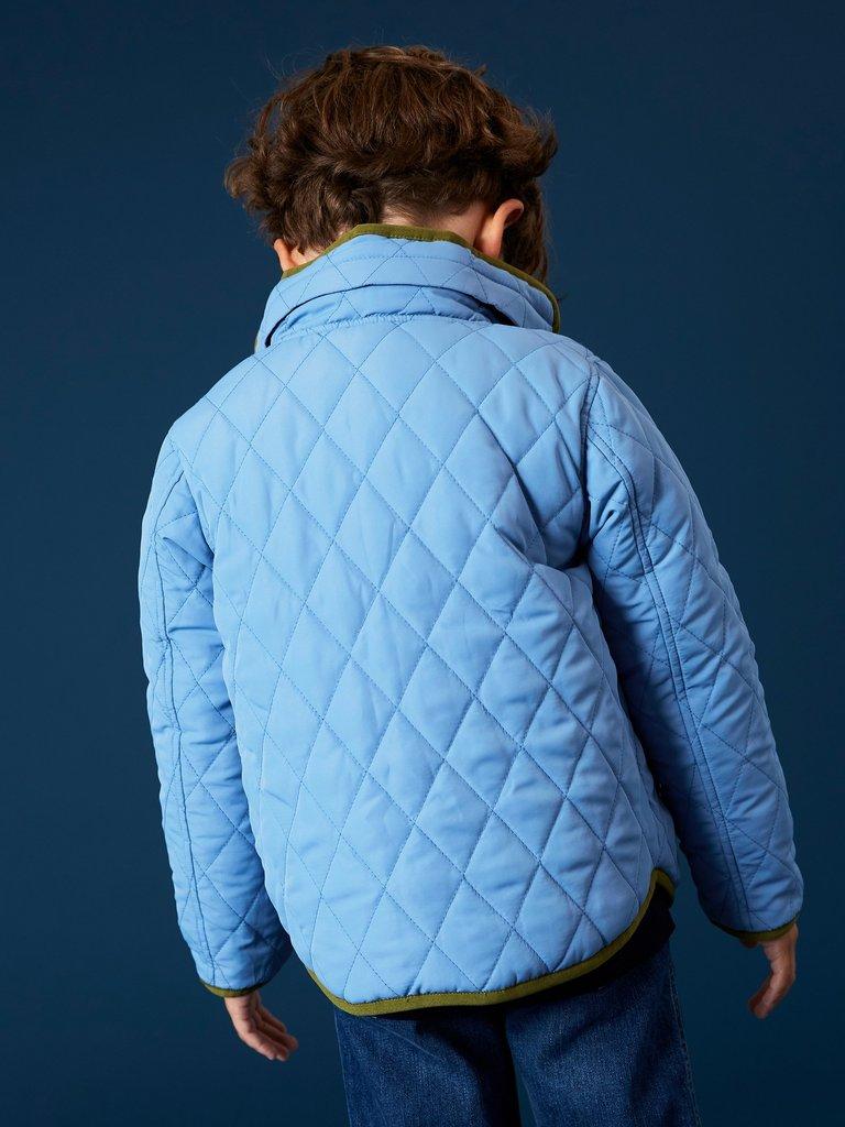 Reversible Quilted Jacket in MID BLUE - MODEL BACK
