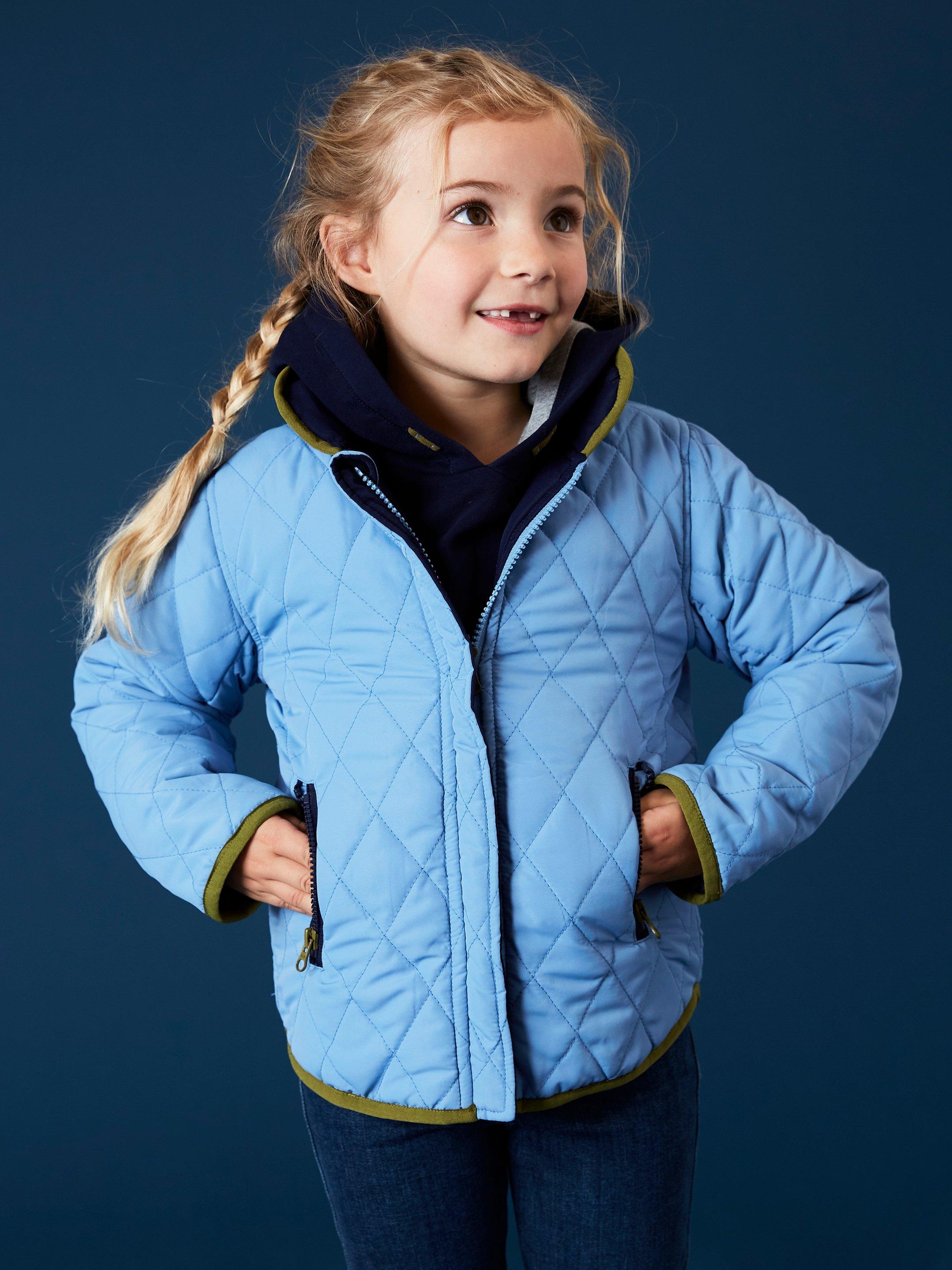 Reversible Quilted Jacket in MID BLUE - MODEL FRONT