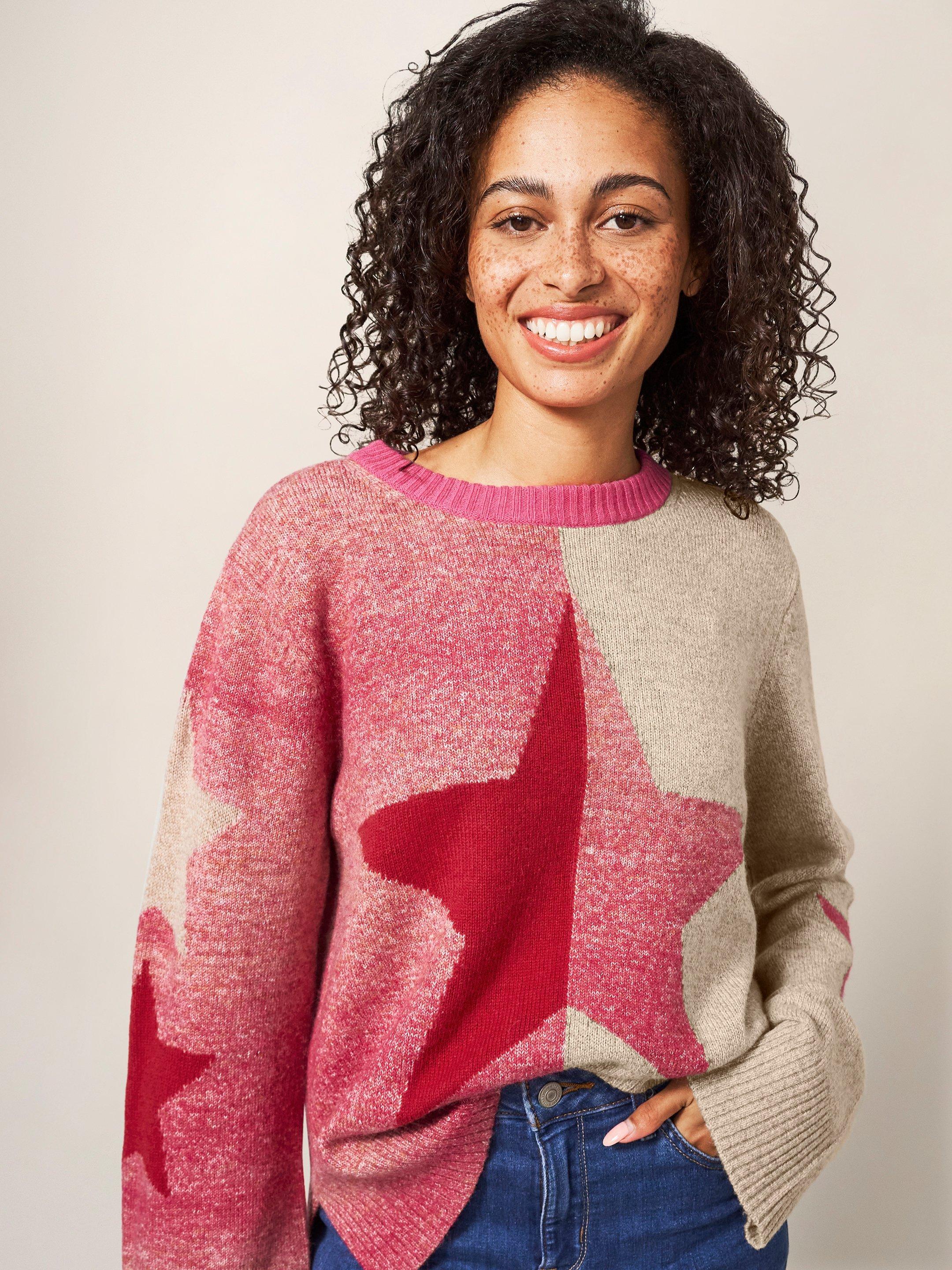 Pink sweater with white stars hotsell