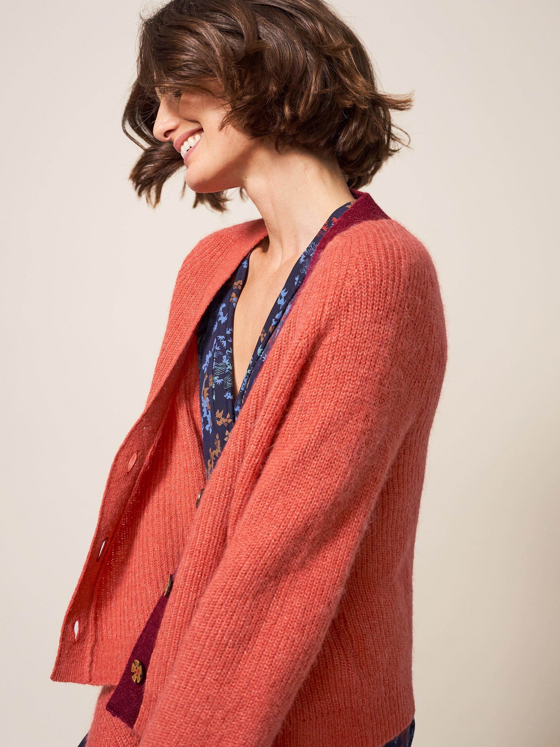 Dehlia Knitted Cardigan in MID ORANGE - MODEL DETAIL