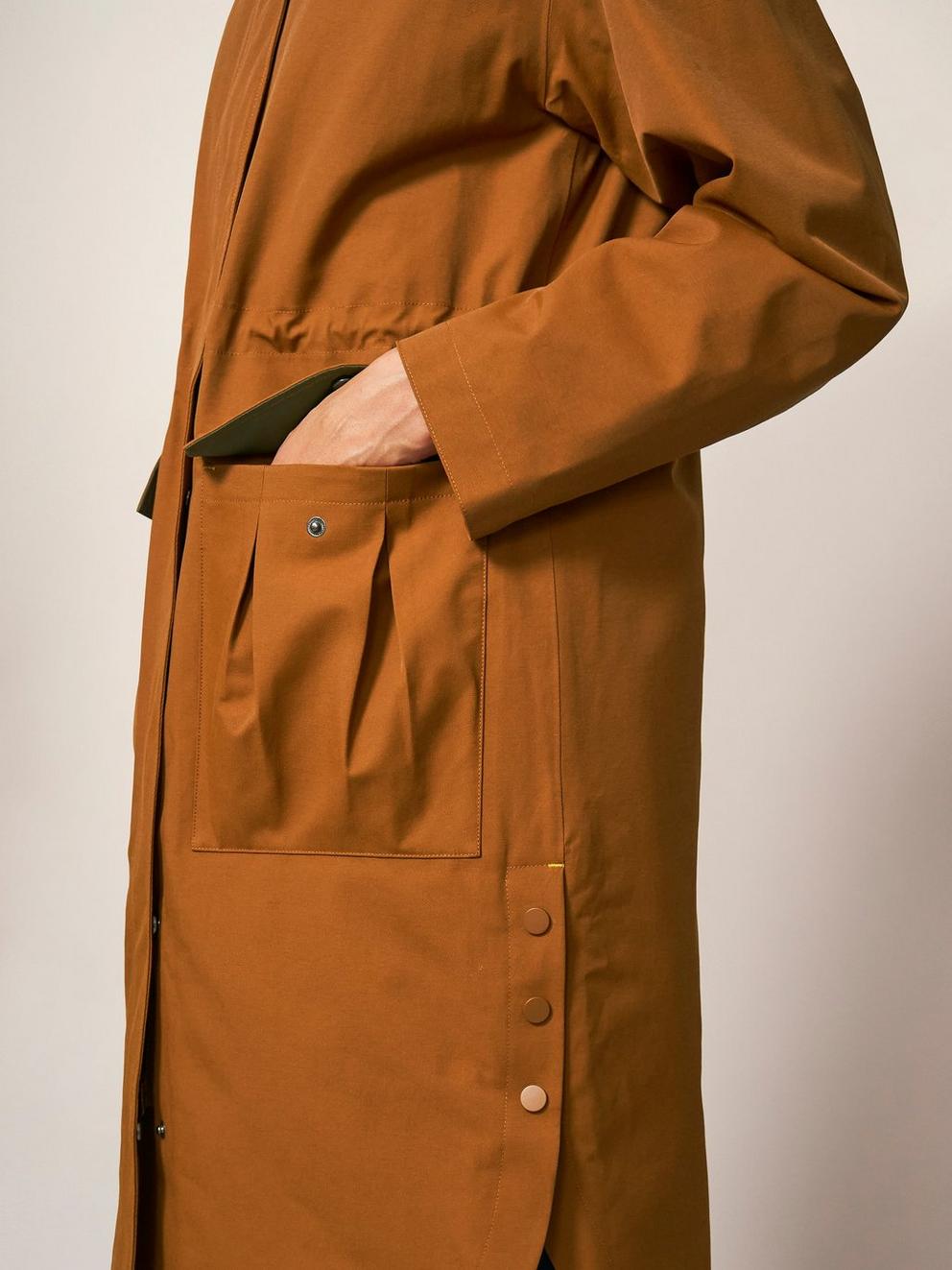 Millie Waterproof Jacket in DARK TAN - MODEL BACK