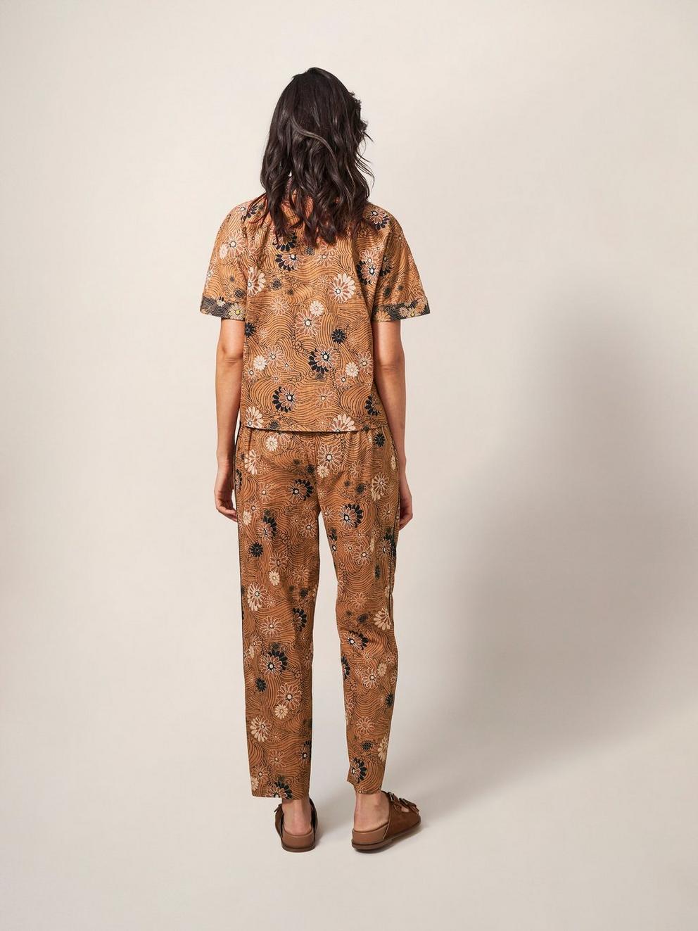 Paige Printed Trouser in ORANGE PR - MODEL BACK