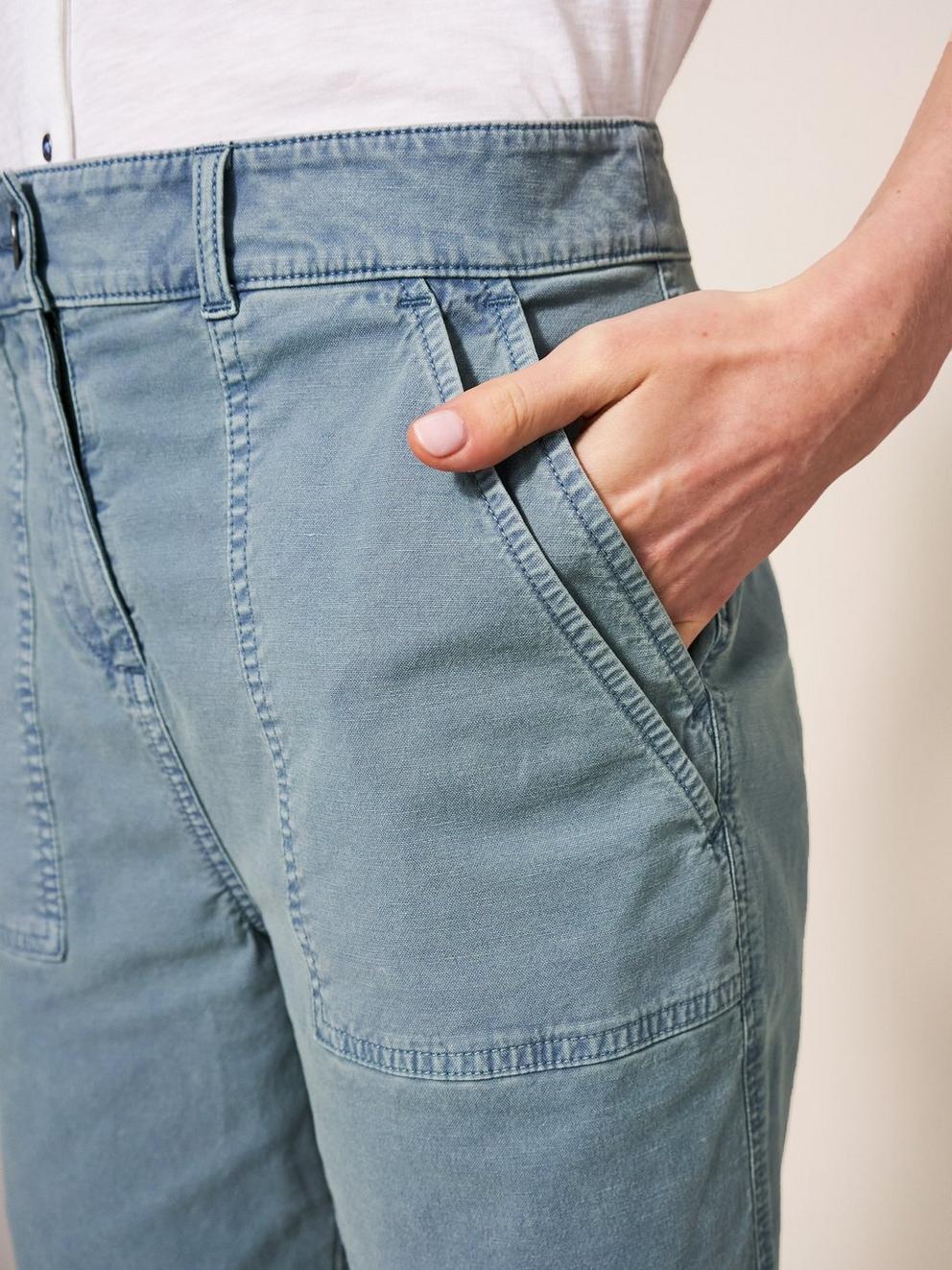 Twister Chino Short in MID TEAL - MODEL DETAIL