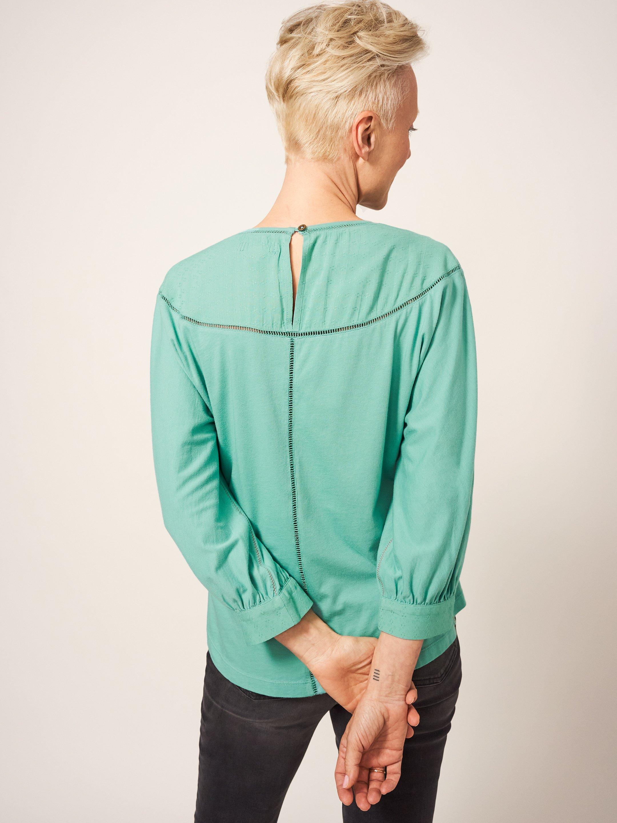 MOLLIE JERSEY MIX TOP in MID TEAL - MODEL BACK