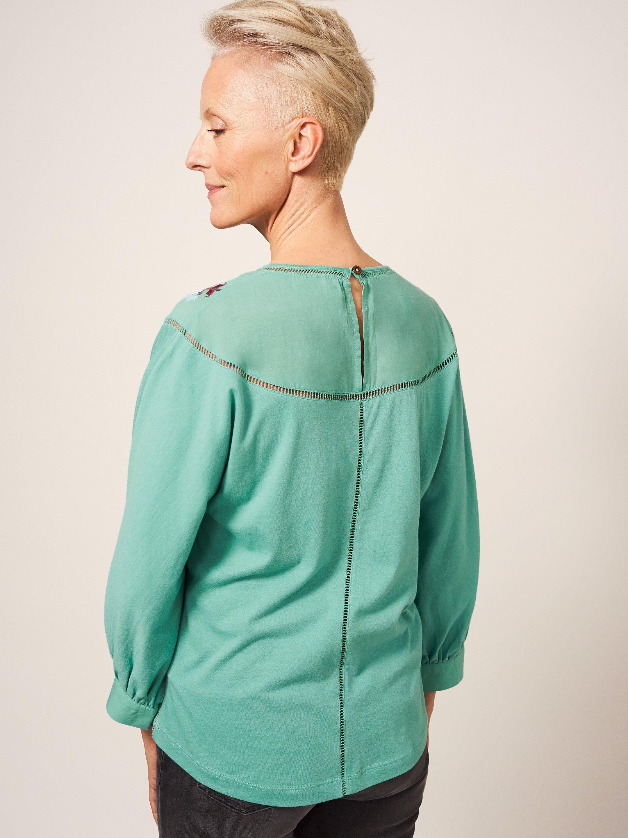 MOLLIE EMBROIDERED TOP in TEAL MLT - MODEL BACK