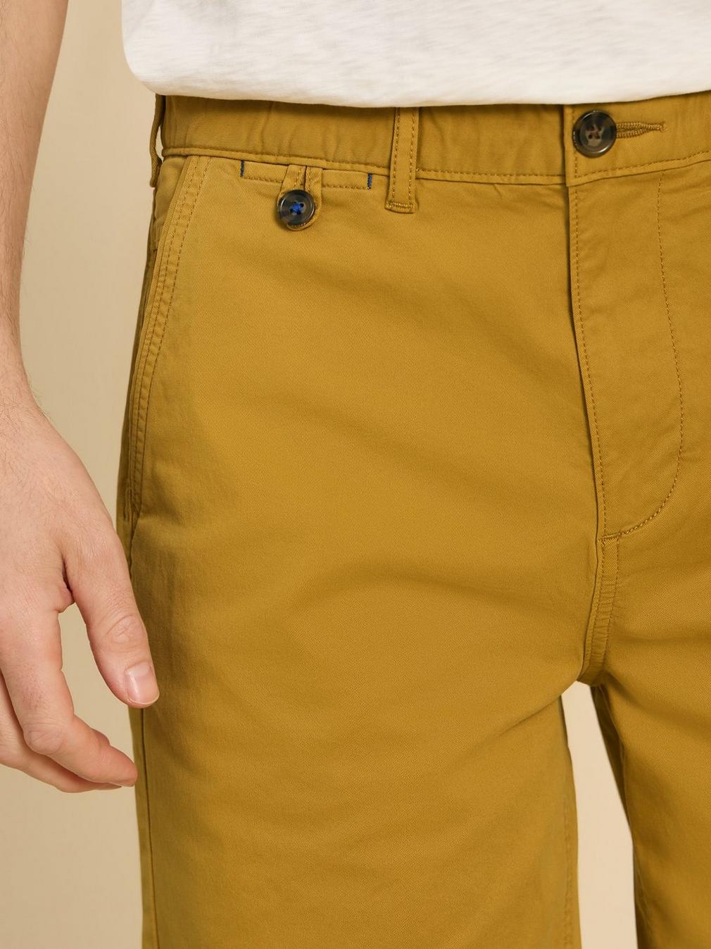 Sutton Organic Chino Short in DP YELLOW - MODEL FRONT