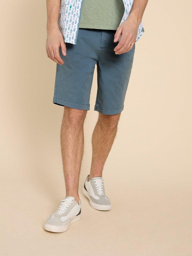 Sutton Organic Chino Short in MID BLUE - MODEL FRONT