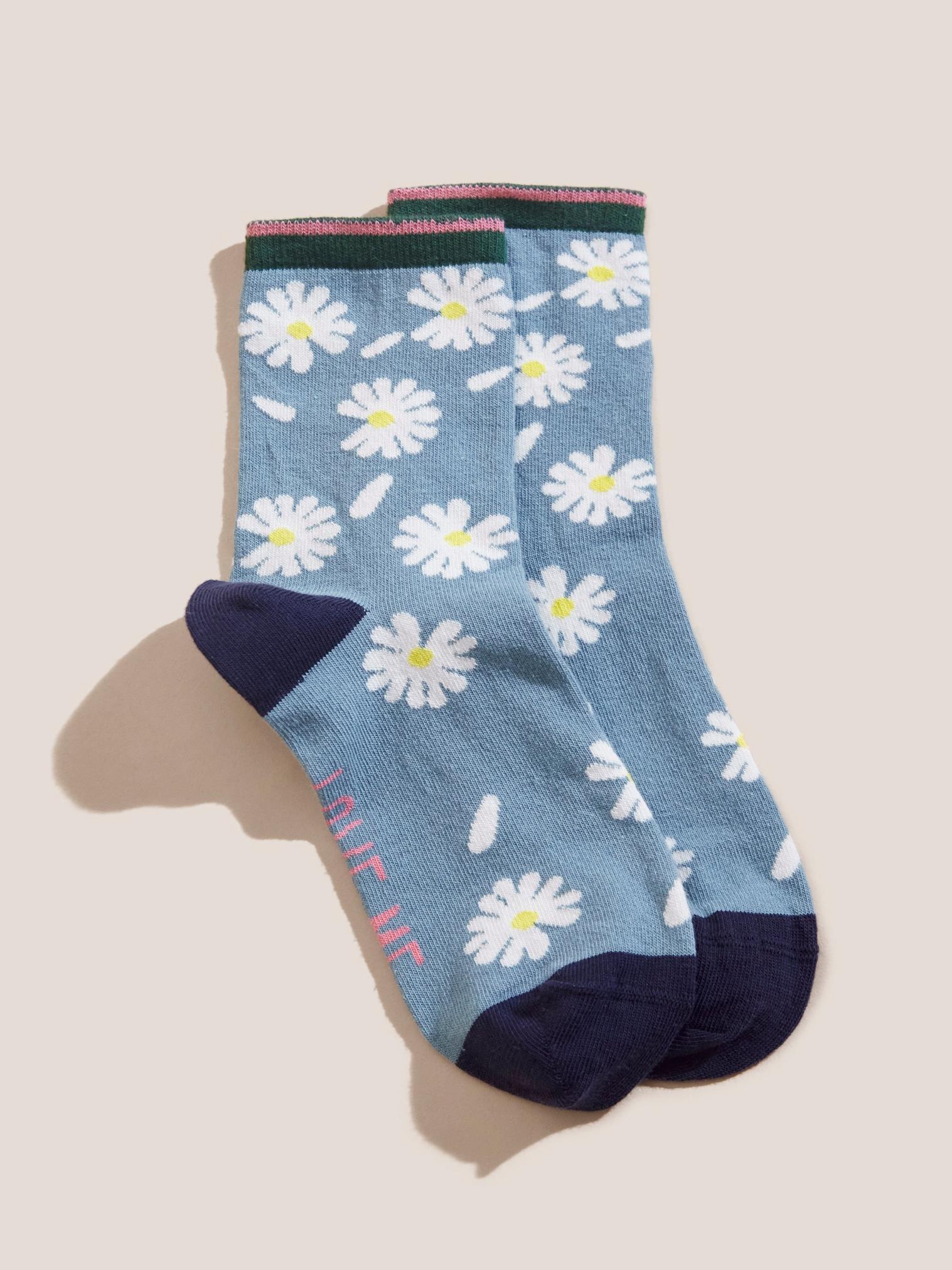 Falling Petal Daisy Socks in TEAL MLT - MODEL FRONT
