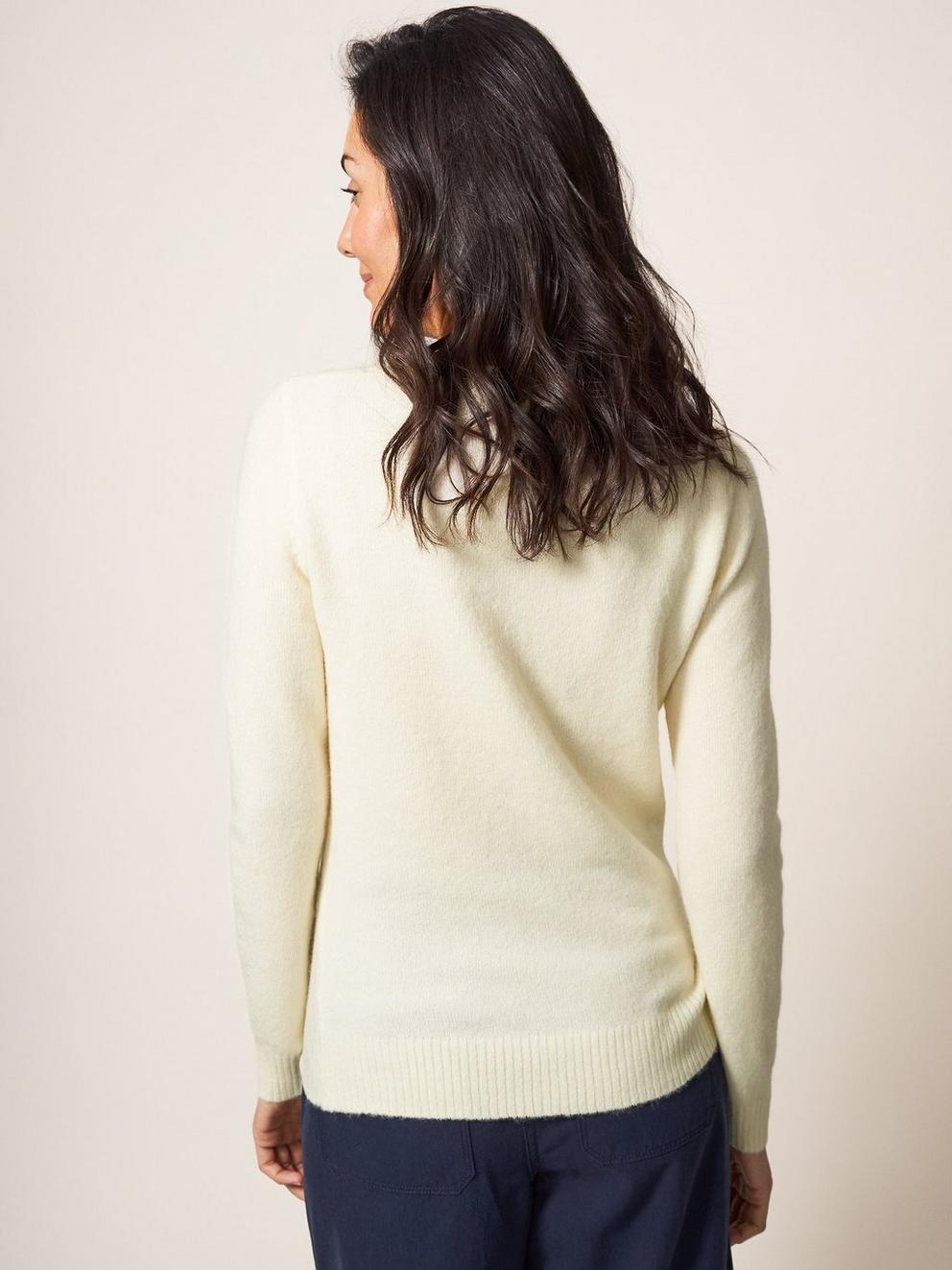 FLORRIE FLORAL JUMPER in PALE IVORY - MODEL BACK