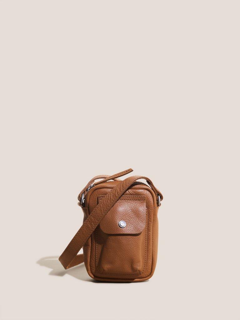 WANDA LEATHER PHONE BAG in MID TAN - MODEL FRONT