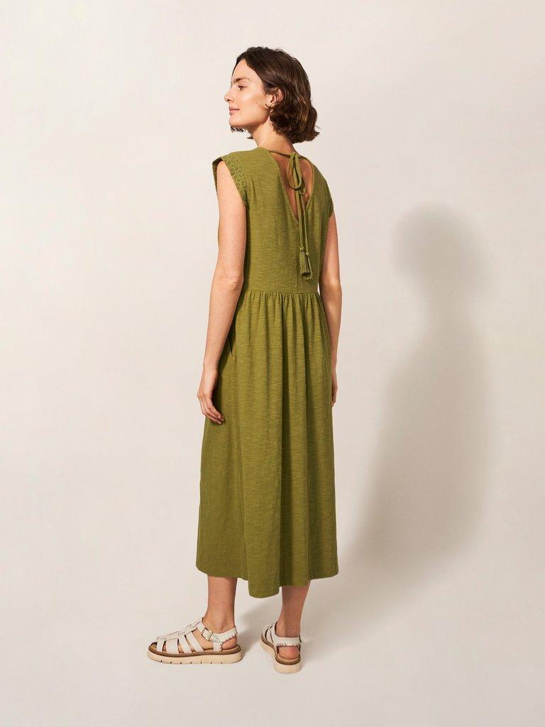 Violet Jersey Broderie Dress in MID GREEN - MODEL BACK