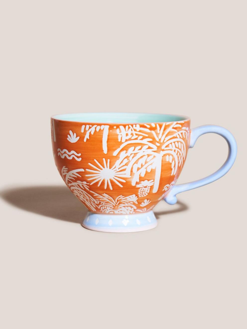 Favourite Tropics Topaz Mug in ORANGE MLT - MODEL FRONT