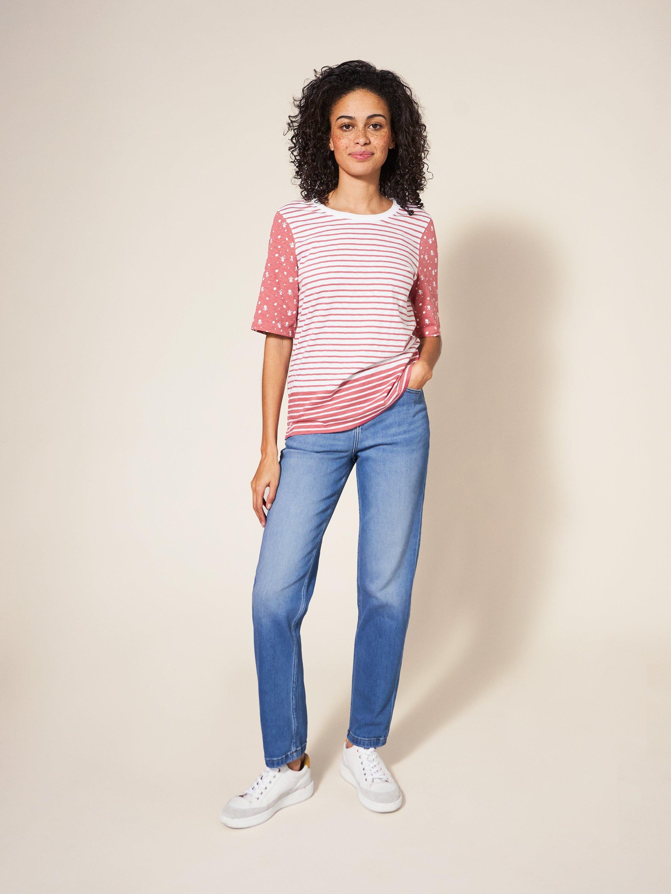 Blue jeans with pink sales stripe