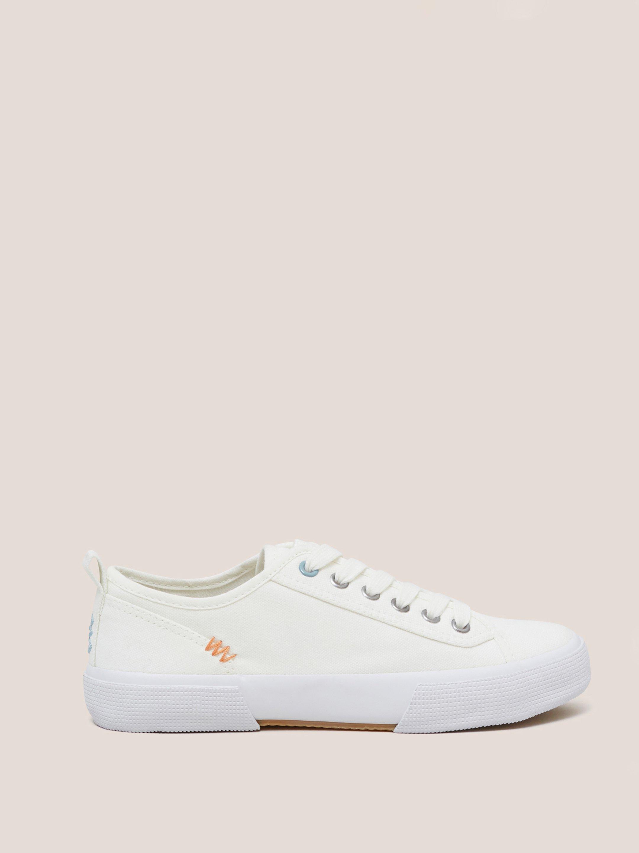 Pippa Canvas Lace Up Trainer in NAT WHITE - MODEL FRONT