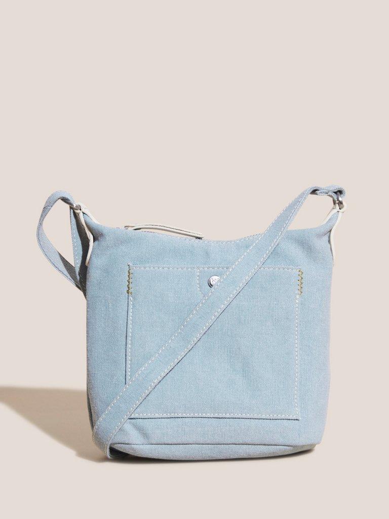 Mini Fern Canvas Crossbody Bag in CHAMB BLUE - MODEL FRONT