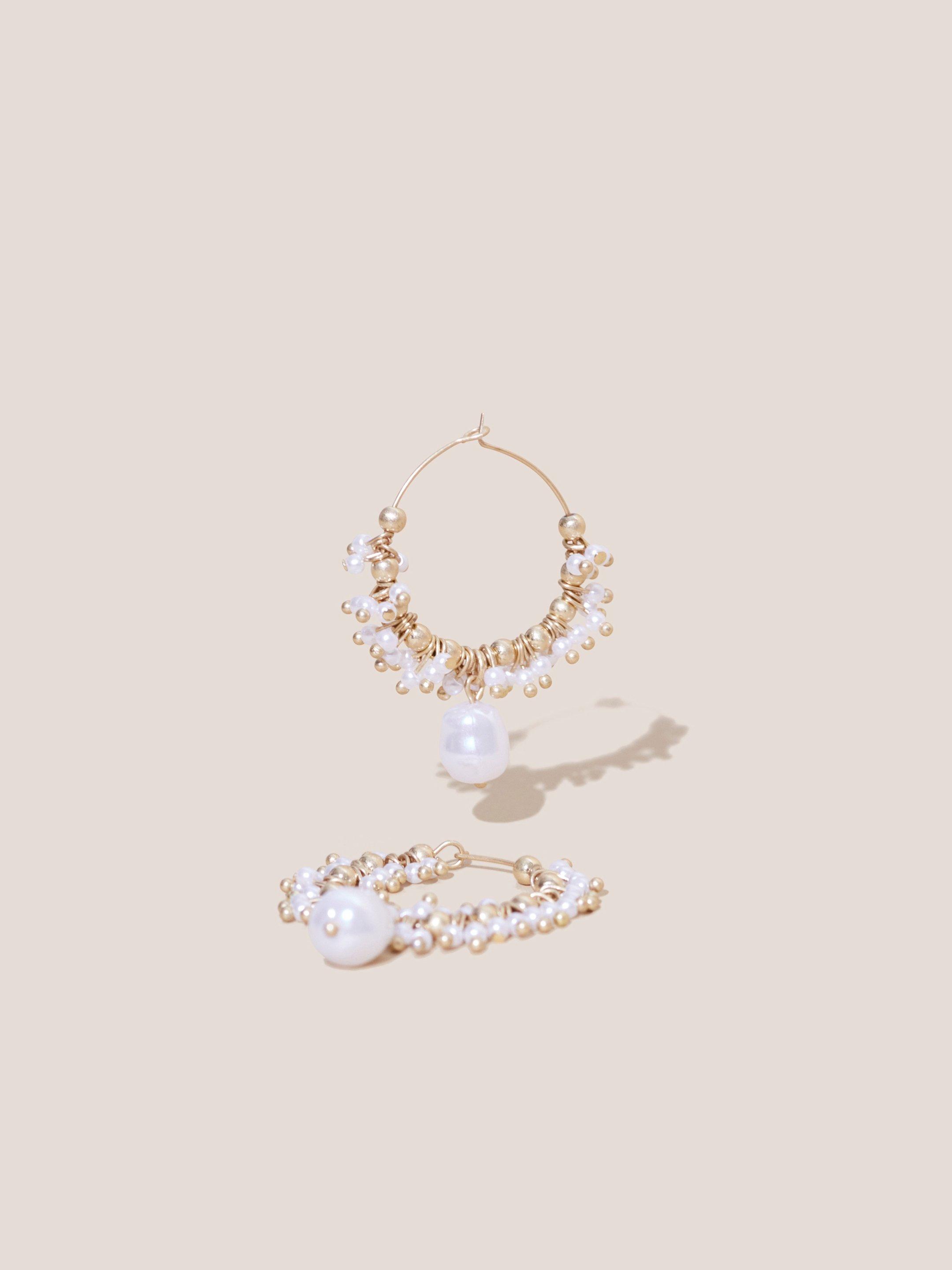MULTI PEARL HOOP DROP EARRINGS in GLD TN MET - MODEL FRONT