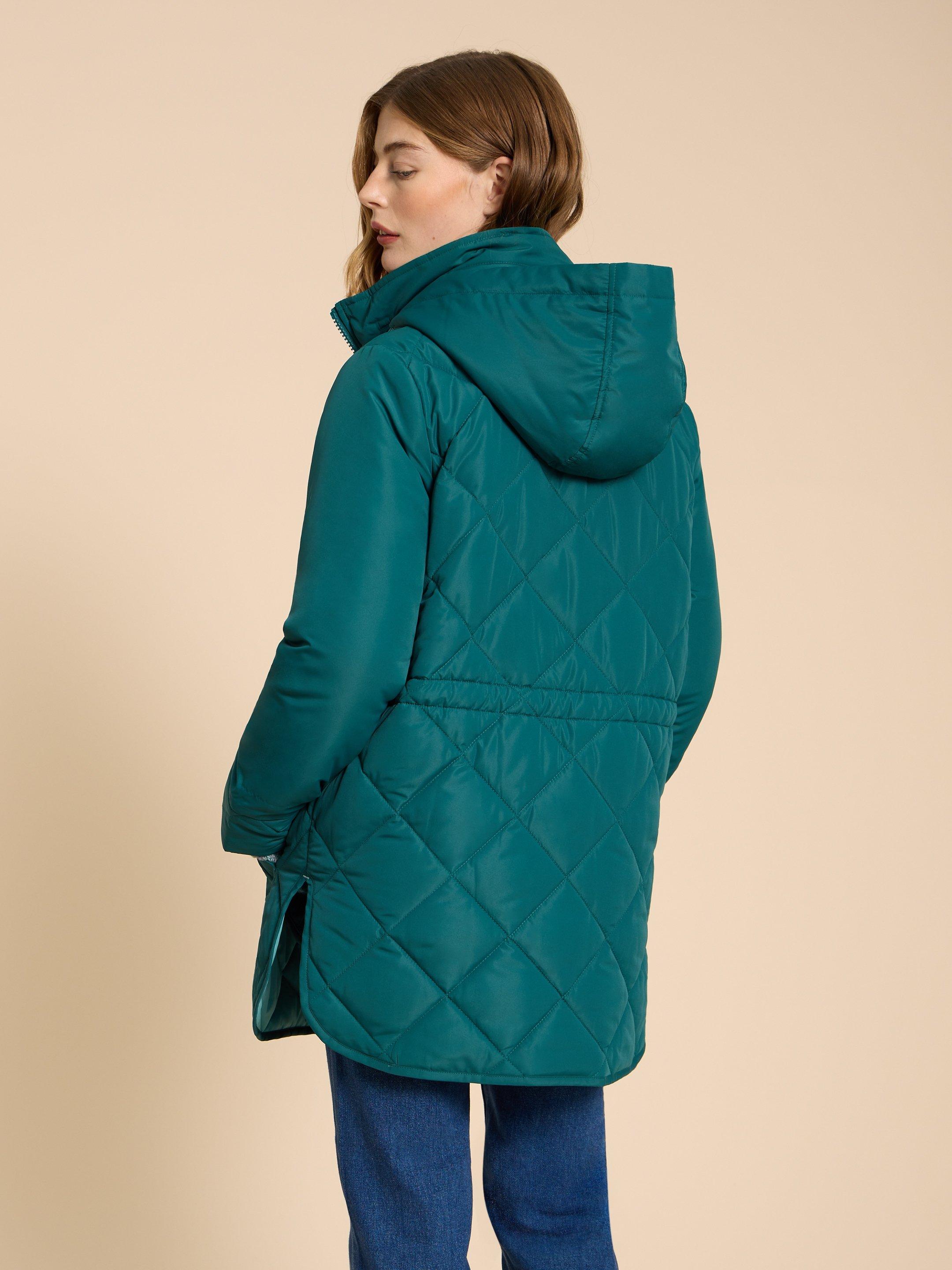 Emilia Quilted Long Sleeve Coat in DK TEAL - MODEL BACK