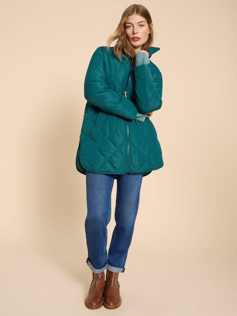 Emilia Quilted Long Sleeve Coat in DK TEAL - MODEL DETAIL