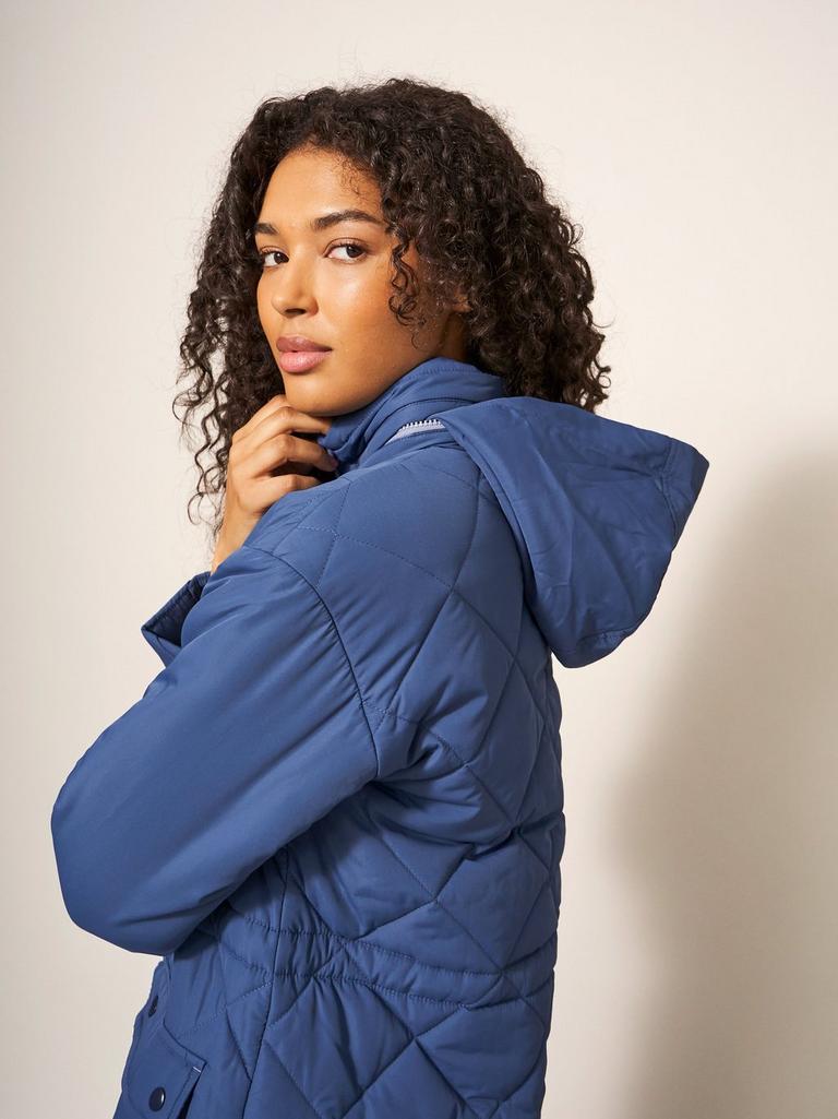 Lorena Quilted Hooded Coat in MID BLUE - MODEL FRONT