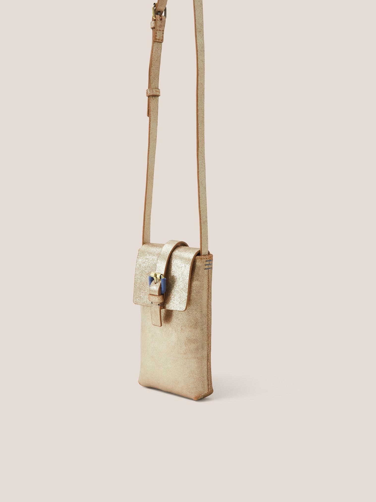 Clara Buckle Leather Phone Bag in GLD TN MET - MODEL FRONT