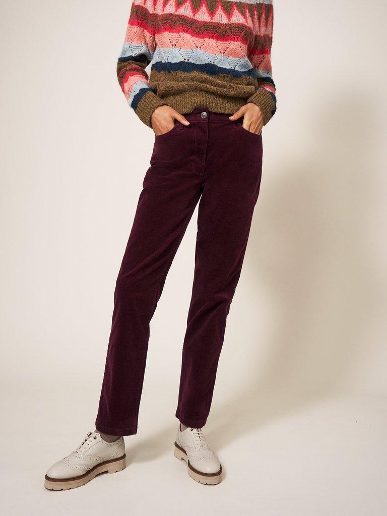 Brooke Mid Rise Cord Trouser in DK PLUM - MODEL DETAIL