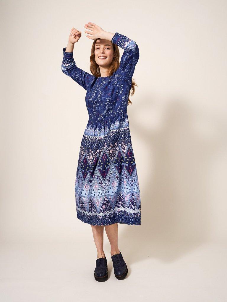Elisa Printed Midi Dress in NAVY MULTI - MODEL FRONT