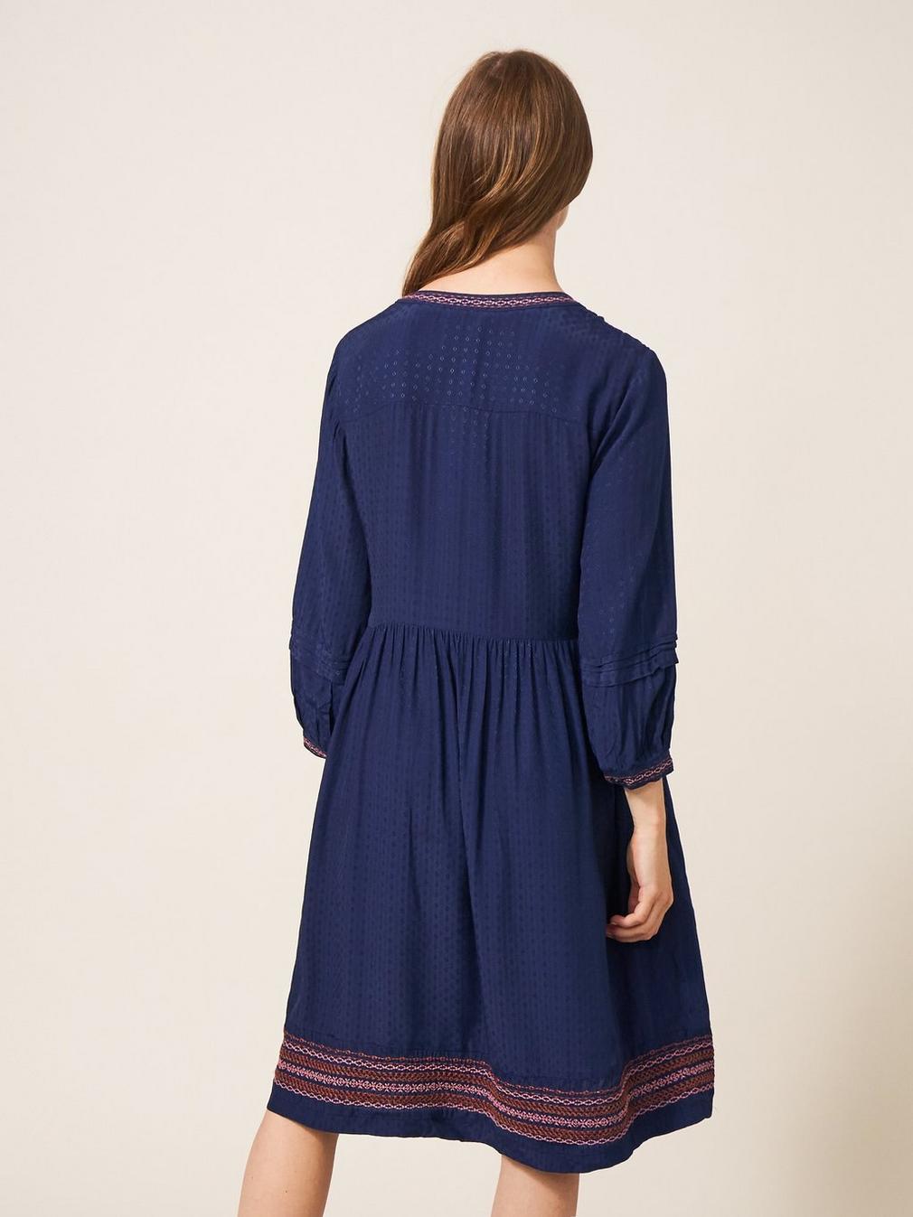 Liv Embroidered Dress in NAVY MULTI - MODEL BACK