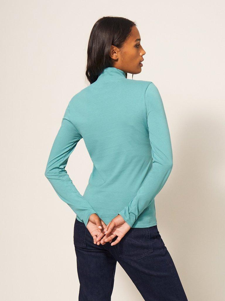 CAMILE HIGH NECK TEE in LGT TEAL - MODEL BACK