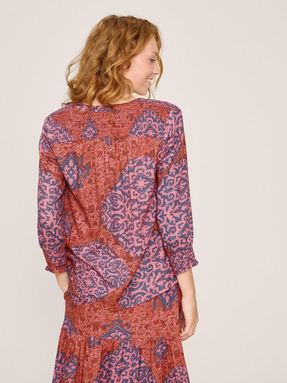 Elisa Eco Vero V Neck Top in RED MLT - MODEL BACK