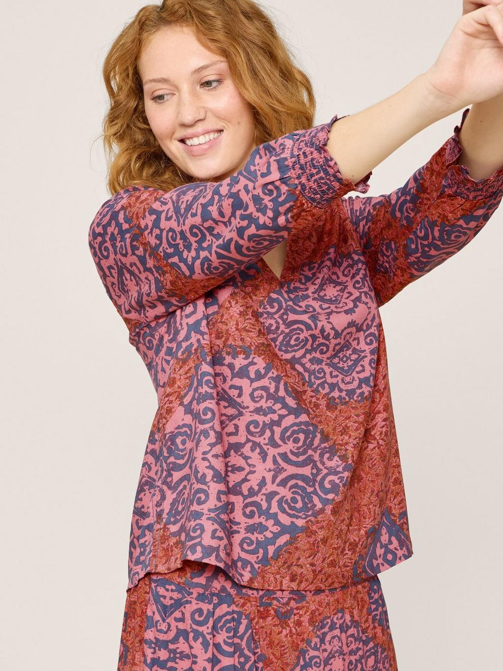 Elisa Eco Vero V Neck Top in RED MLT - MODEL DETAIL